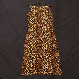 Very form fitting sleeveless women’s dress.